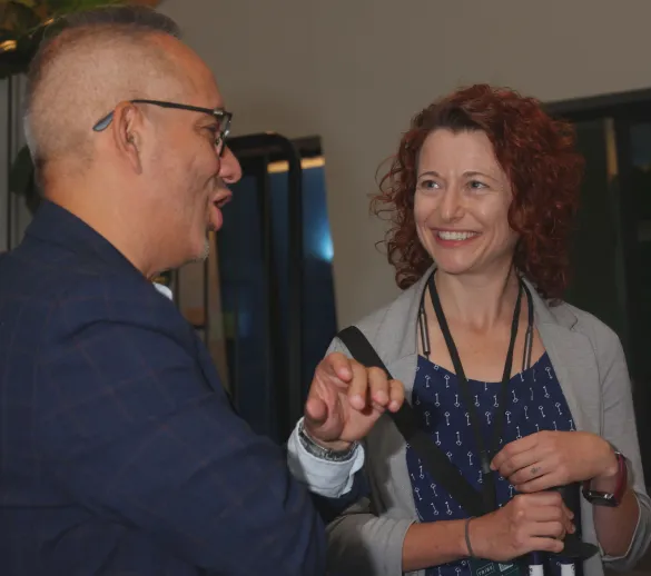 Attendees in conversation